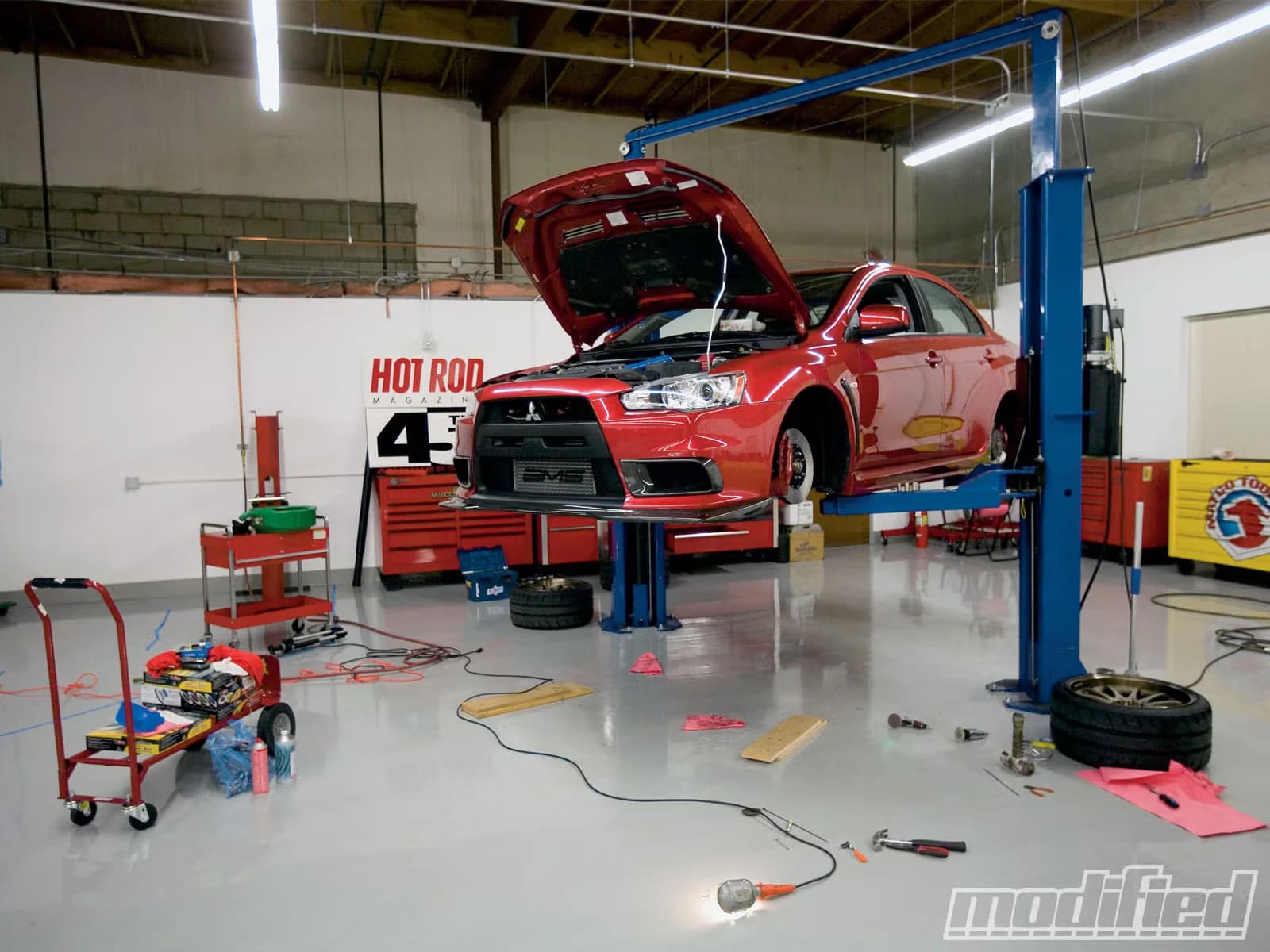 Finish one car. The other two are why you're broke.
